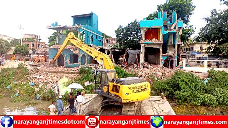 ধলেশ্বরীর তীরে দোতলা ভবনসহ আরো অর্ধশতাধিক অবৈধ স্থাপনা উচ্ছেদ ধলেশ্বরীর তীরে দোতলা ভবনসহ আরো অর্ধশতাধিক অবৈধ স্থাপনা উচ্ছেদ