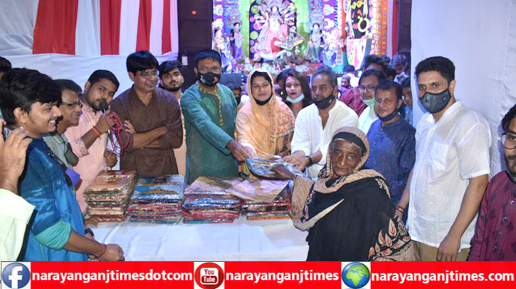 নিতাইগঞ্জ সার্বজনীন দূর্গাপূজা মন্ডপ কমিটির উদ্যোগে বস্ত্র বিতরণ নিতাইগঞ্জ সার্বজনীন দূর্গাপূজা মন্ডপ কমিটির উদ্যোগে বস্ত্র বিতরণ