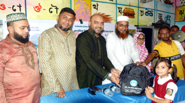প্রতিভা সমাজ কল্যাণ সংস্থার আয়োজনে স্কুলব্যাগ ও বৃক্ষ বিতরণ