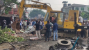 আদমজী ইপিজেড এলাকায় রেলওয়ের জমিতে উচ্ছেদ অভিযান আদমজী ইপিজেড এলাকায় রেলওয়ের জমিতে উচ্ছেদ অভিযান